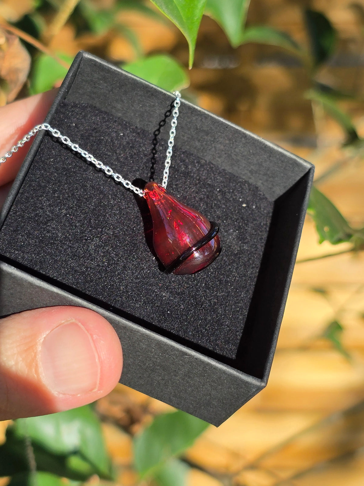 Pendentif d'olfactothérapie® - Rouge spirale noire